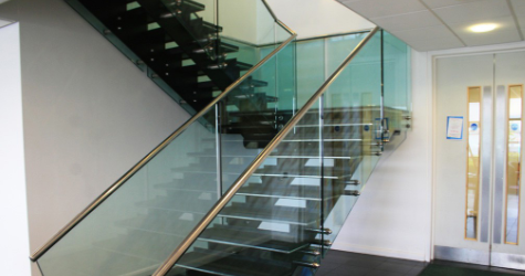 Image of a stainless steel and glazed stair in a commercial building
